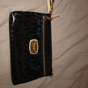 Micheal Kors black patent wristlet